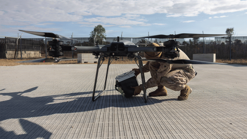 U.S. Marine Corps Cpl. Angel DepazValenzuela, a distribution specialist with Combat Logistics Battalion 5, Marine Rotational Force – Darwin 26, secures a cooler to a TRV-150 Tactical Resupply Unmanned Aerial System for a blood resupply rehearsal during Exercise Predator’s Run 26 at Townsville Field Training Area in Queensland, Australia, July 23, 2026. 