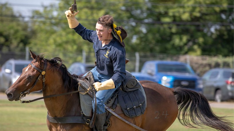 U.S. Army Soldier with the 1st Cavalry Division Horse Detachment demonstrates expert marksmanship on horseback, firing a historic revolver during a weekly mounted demonstration at Fort Cavazos, Texas, July 30, 2026.