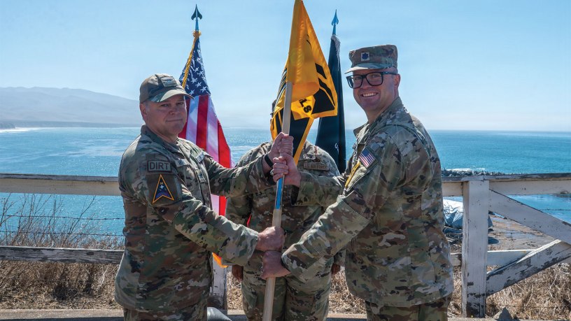U.S. Space Force Col. James T. Horne III, left, Space Launch Delta 30 commander, passes the ceremonial guidon to Lt. Col. Kyle Rowland, right, 4th Space Launch Squadron incoming commander, during the 4th SLS reactivation ceremony at Vandenberg Space Force Base, California, July 31, 2026.