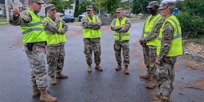 U.S. Soldiers assigned to the Wisconsin Army National Guard’s Task Force Sturgeon discuss ongoing traffic management operations in Menasha, Wisconsin, July 31, 2026.