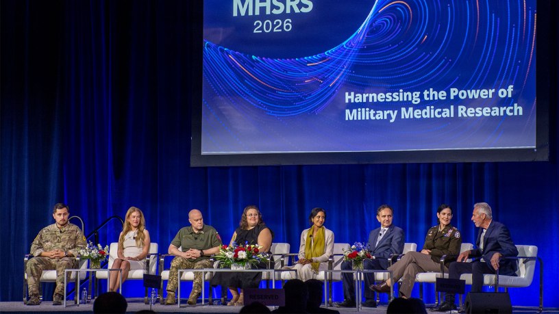 Panelists on the “Multidrug Resistant Organisms & Cellular Therapy for battlefield Trauma” session discuss issues of drug-resistant viruses at the 2026 Military Health System Research Symposium in Kissimmee, Florida, Aug. 3.