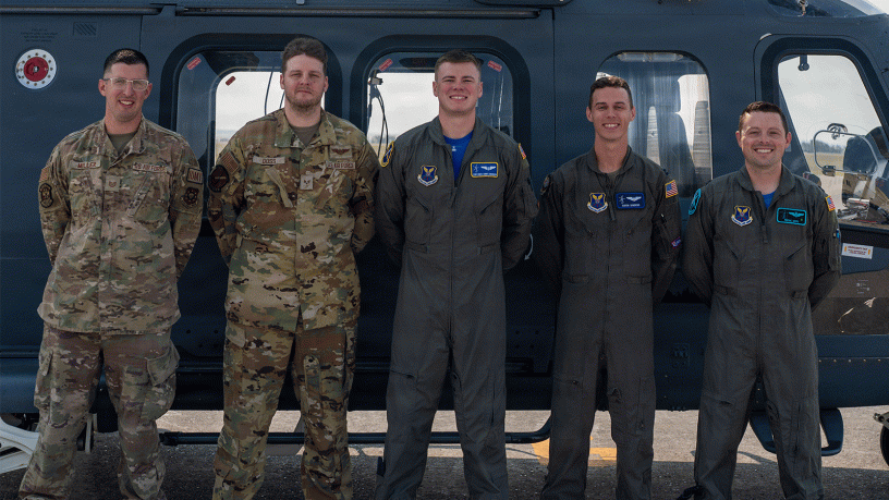 Tech. Sgt. Homer Miller, Malmstrom Operational Medical Readiness Squadron flight medicine section chief, Senior Airman Dakota Doss, 40th Helicopter Squadron (HS) special missions aviator, Staff Sgt. Owen Anderson, 40th HS weapons and tactics noncommissioned officer in charge, Capt. Aaron Sanders, 550th HS standards and evaluation officer, and Capt. Jacques Soto, 40th HS MH-139A chief of standards and evaluations, pose for a photo in front of an MH-139A Grey Wolf helicopter at Malmstrom Air Force Base, Montana, Aug. 7, 2026.
