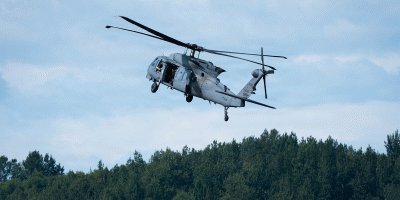 A U.S. Air Force HH-60W Jolly Green II helicopter assigned to the 210th Rescue Squadron, Alaska Air National Guard, flies during the Joint Forces Demonstration at the Arctic Thunder Open House at Joint Base Elmendorf-Richardson, Alaska, Aug. 8, 2026.