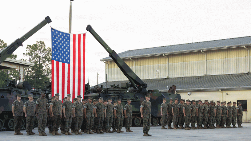 U.S. Marines with Company B, 4th Assault Amphibian Battalion, Marine Forces Reserve, stand in formation during a sundown ceremony for the assault amphibious vehicle, Jacksonville, Florida, August 9, 2026.