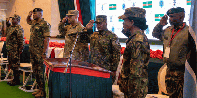 Members of the North Carolina National Guard and Botswana Defense Force render salutes during the playing of the U.S. and Botswana national anthems during an opening ceremony for Exercise Southern Accord 2026 at Gaborone Technical College in Gaborone, Botswana, August 10, 2026.