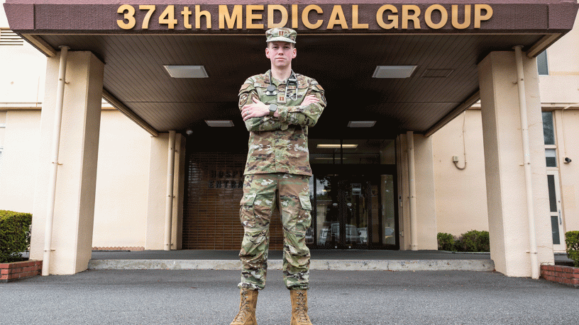 U.S. Air Force Capt. Zachary Hicks, 374th Health Care Operations Squadron, family medicine physician, poses for a photo outside the 374 HCOS at Yokota Air Base, Japan, Aug. 11, 2026.