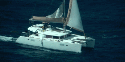 Photo taken by U.S. Coast Guard Air Station Miami HC-144 Ocean Sentry aircrew of an overdue sailing catamaran and Peter Baron shortly before his rescue by a Dutch Coast Guard marine unit, approximately 11 nautical miles west of Sint Maarten, Aug.13, 2026. “I am incredibly proud of our Coast Guard servicemembers and commend the phenomenal efforts of our French, Dutch, and Virgin Islands partners, which ensured this mariner’s safe return to his family,” said Cmdr. Matthew Romano, Coast Guard Search and Rescue mission coordinator for the case.