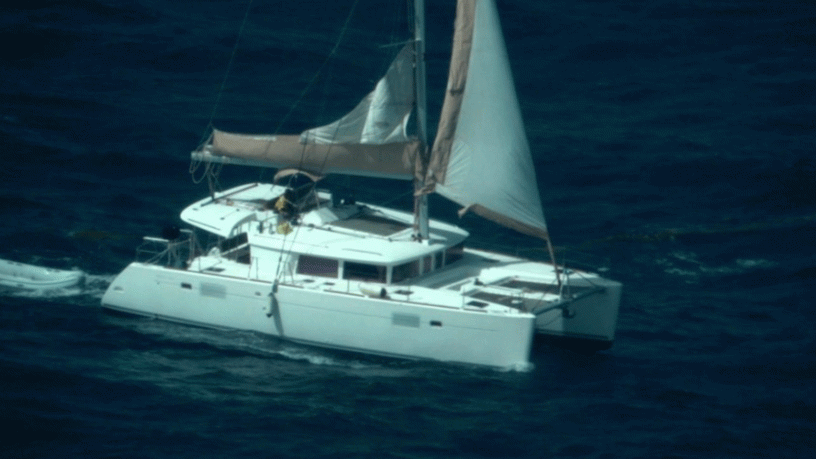 Photo taken by U.S. Coast Guard Air Station Miami HC-144 Ocean Sentry aircrew of an overdue sailing catamaran and Peter Baron shortly before his rescue by a Dutch Coast Guard marine unit, approximately 11 nautical miles west of Sint Maarten, Aug.13, 2026. “I am incredibly proud of our Coast Guard servicemembers and commend the phenomenal efforts of our French, Dutch, and Virgin Islands partners, which ensured this mariner’s safe return to his family,” said Cmdr. Matthew Romano, Coast Guard Search and Rescue mission coordinator for the case.