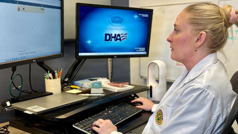 Defense Health Agency Physician Assistant Mikaela Altis logs into the Ambient Listening program to review a patient record at Munson Army Health Center, Fort Leavenworth, Kansas, Aug. 14, 2026.