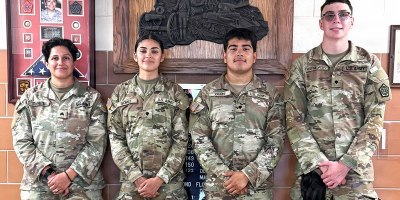 From left, Sgt. Summer Flores, Spc. Melissa Gomez, Spc. Joel Ocon, and Spc. Simon Rupniewski assisted a man involved in a serious motorcycle accident on Aug. 10 when the Illinois Army National Guard’s North Riverside-based 708th Medical Company (Ground Ambulance) was training as part of Northern Strike on Camp Grayling Joint Maneuver Training Center in Michigan. (Courtesy photo.)