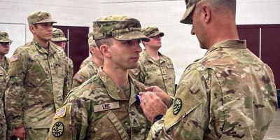 U.S. Army Brig. Gen. Trenton J. Gibson, Adjutant General of the Montana National Guard, presents the Soldier’s Medal to U.S. Army Sgt. Adam M. Lee during a ceremony at the Belgrade Armory in Belgrade, Montana, Aug. 16, 2026.
