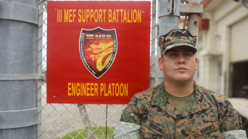U.S. Marine Corps Lance Cpl. Marshall Martinez, a native of California and a combat engineer with III Marine Expeditionary Force Support Battalion, III MEF Information Group, poses for a photo at Camp Hansen, Okinawa, Japan, Aug. 19, 2026.