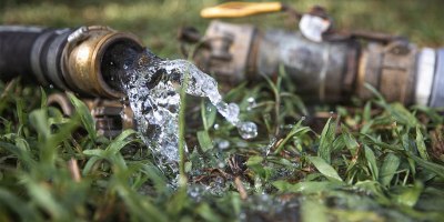 Product water flows from a hose during Puerto Rico Army National Guard water purification operations in Canóvanas, Puerto Rico, Aug. 20, 2026.