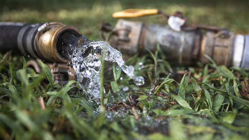 Product water flows from a hose during Puerto Rico Army National Guard water purification operations in Canóvanas, Puerto Rico, Aug. 20, 2026.