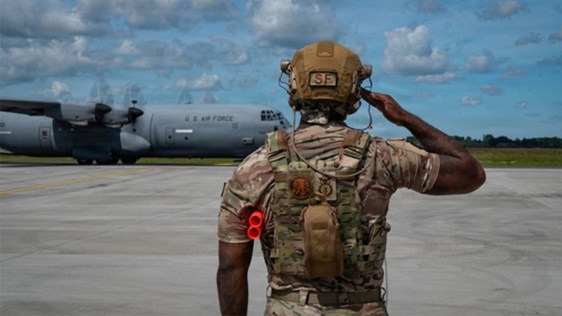 A U.S. Air Force technical sergeant, 172nd Airlift Wing, marshals an aircraft at Karup Air Base, Denmark, June 18, 2026. The wing was recognized as one of 13 military programs for their commitment and innovation in outstanding suicide prevention efforts to save lives at the 2026 Suicide Prevention Recognition Ceremony Sept. 2 at the Pentagon, presented by Defense Suicide Prevention Office.