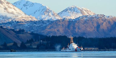 The crew of the Coast Guard Cutter Long Island departs Womens Bay, Alaska, near Kodiak Island March 9, 2014. The crew of the 110-foot Island-class patrol boat, home-ported in Valdez, was in the Kodiak region to conduct fisheries enforcement boardings for the halibut and sablefish season openers. (U.S. Coast Guard photo by Chief Petty Officer Sara Mooers)