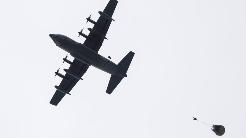 Alaska Air National Guard pararescuemen assigned to the 212th Rescue Squadron conduct a static line jump from a 211th Rescue Squadron HC-130J Combat King II during water rescue training in the Prince William Sound near Whittier, Alaska, May 16, 2024.