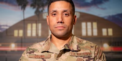 Air Force Senior Master Sgt. Luis Colon, 927th Security Forces Squadron operations superintendent, MacDill Air Force Base, Florida, poses for a photo, June 26, 2026. Colon rescued a driver from a burning vehicle while on duty as a Sarasota, Florida, police officer. (U.S. Air Force photo by Tech. Sgt. Bradley Tipton)