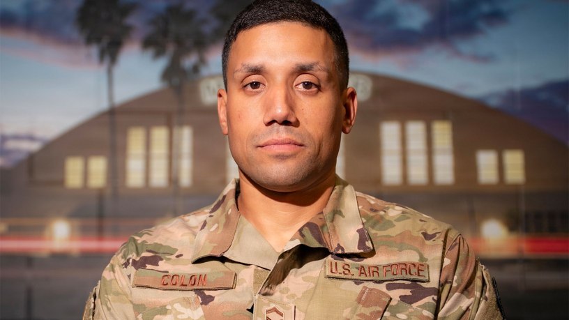Air Force Senior Master Sgt. Luis Colon, 927th Security Forces Squadron operations superintendent, MacDill Air Force Base, Florida, poses for a photo, June 26, 2026. Colon rescued a driver from a burning vehicle while on duty as a Sarasota, Florida, police officer. (U.S. Air Force photo by Tech. Sgt. Bradley Tipton)