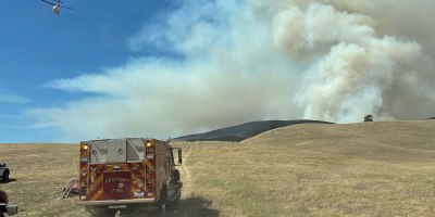 Camp Parks firefighters in Water Tender 44, approach a boundary of the Little Fire, July 21, 2026, in support of Alameda County Fire Department and California Department of Forestry and Fire Protection.
