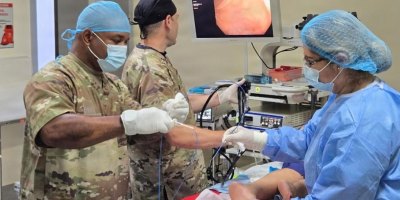 U.S. Army Sgt. 1st Class Bertie Charles (pictured left), detachment sergeant for U.S. Army Health Clinic Stuttgart, Germany, supported a Global Health Engagement rotation in Panama from July 23 through Aug. 5, 2026.