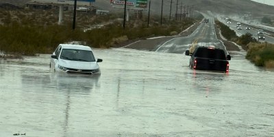 Marine Corps Logistics Base Barstow Fire and Emergency Services personnel responded to a reported swift-water rescue in the Yermo, California area, August 11, 2026, successfully rescuing two people from a partially submerged vehicle despite challenging flood conditions and degraded communications.