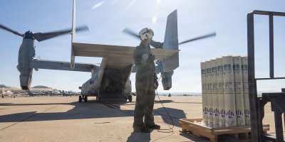 U.S. Marine Corps Cpl. Donovan Nickelson, a crew chief with Marine Operational Test and Evaluation Squadron 1 (VMX-1), prepares to load sonobuoys onto a U.S. Marine Corps MV-22B Osprey assigned to VMX-1 at Marine Corps Air Station Miramar, California, Aug. 19, 2026.