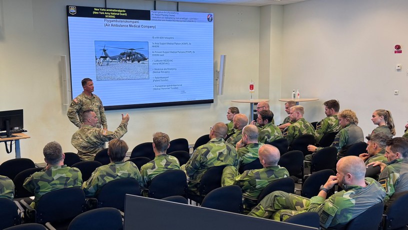 Army Lt. Col. Eric Fritz, the commander of the New York Army National Guard’s 3rd Battalion, 142nd Assault Helicopter Battalion, conducts one of a series of classes on Army air assault doctrine conducted for Swedish Air Force aviators at Malmen Air Base outside of Linkoping, Sweden on August 26, 2026.