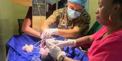 U.S. Army Sgt. Meltem Pelek with the 30th Medical Brigade, treats a patient alongside a Burundi National Defence Force medical professional during a medical readiness exercise at Kamenge Military Hospital, Bujumbura, Burundi, Aug. 26, 2026.