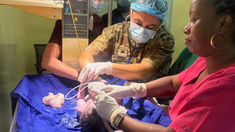 U.S. Army Sgt. Meltem Pelek with the 30th Medical Brigade, treats a patient alongside a Burundi National Defence Force medical professional during a medical readiness exercise at Kamenge Military Hospital, Bujumbura, Burundi, Aug. 26, 2026.