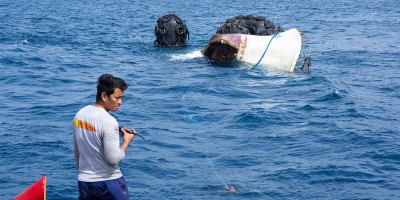 A Palaun civilian mariner aboard the tug boat SSC Tanchall monitors the list and trim of the abandoned derelict vessel “Justice 1” while it is towed out to sea during a Pacific Partnership 2026 salvage operation in Koror, Palau, Aug. 30, 2026.