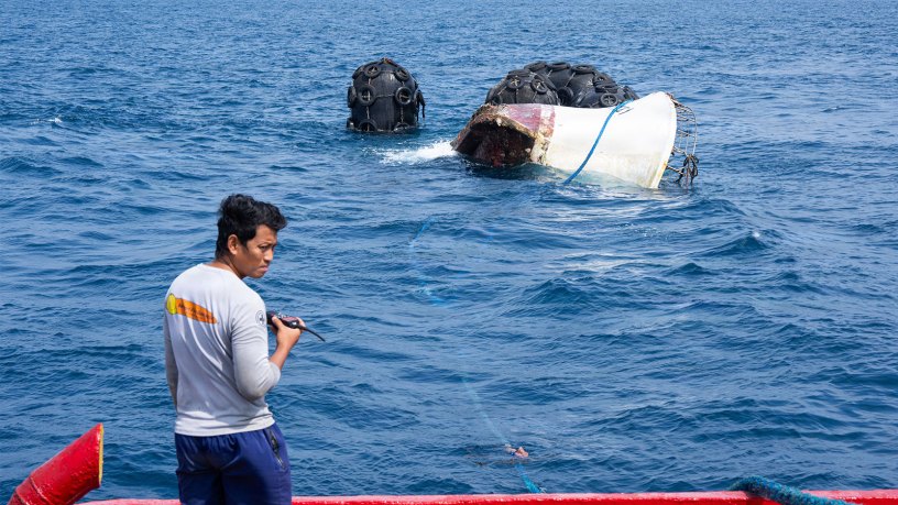 A Palaun civilian mariner aboard the tug boat SSC Tanchall monitors the list and trim of the abandoned derelict vessel “Justice 1” while it is towed out to sea during a Pacific Partnership 2026 salvage operation in Koror, Palau, Aug. 30, 2026.