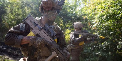 U.S. Army Staff Sgt. Kevin Ortega, assigned to Charlie Company, 2nd Battalion, 37th Armored Regiment, NATO Forward Land Forces (FLF) Battle Group-Poland, tactically moves through the bayonet lane during the British Exercise Masurian Patrol at Bemowo Piskie Training Area (BPTA), Poland on Sept. 1, 2026.