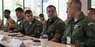 Brazilian air force members discuss applications of space operations during the 2026 Space Doctrine Conference in Tucson, Arizona, Sept. 1, 2026.