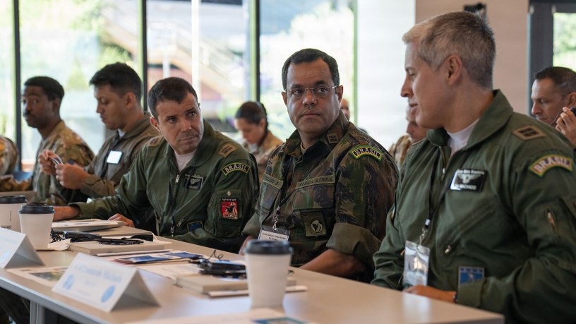Brazilian air force members discuss applications of space operations during the 2026 Space Doctrine Conference in Tucson, Arizona, Sept. 1, 2026.