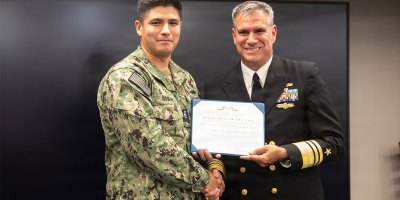 Vice Adm. Douglas Williams, director of Portfolio Acquisition Executive (PAE) Strategic Systems Programs (SSP) presented Chief Warrant Officer 3 (CW03) Anthony Roman with the Navy Commendation Medal on 4 September.