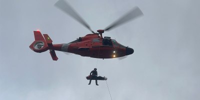 An aircrew from the U.S. Coast Guard Air Station North Bend hoists and injured hiker from a lava field near North Sister, Oregon, Saturday, Sept. 5, 2026. Due to loose rock and steep terrain, the ropes team could neither hike the patient out nor create anchors for a safe rope rescue. (U.S. Coast Guard Video Courtesy of Air Station North Bend)