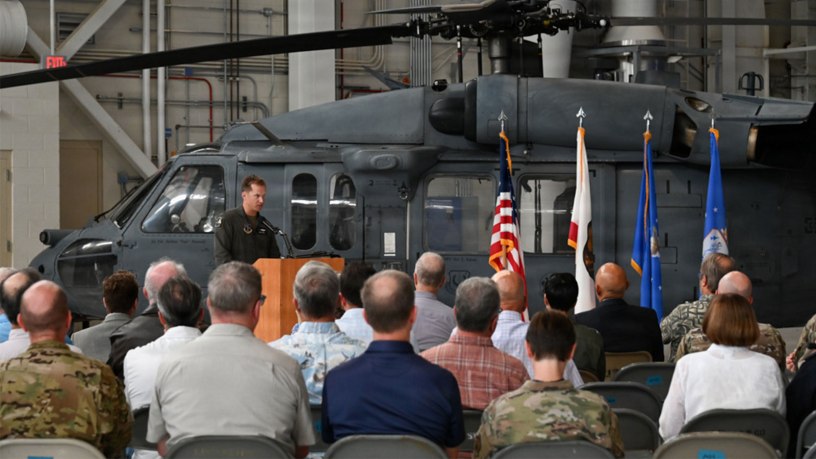 Airmen and guests celebrate the divestment of the last operational HH-60G Pave Hawk helicopter during a ceremony at the 129th Rescue Wing at Moffett Air National Guard Base, California, on Sept. 10, 2026.