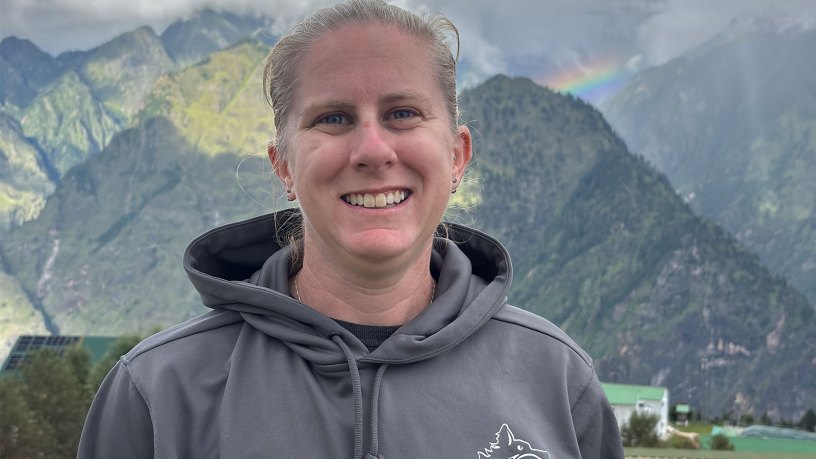 U.S. Army civilian Angela Hartman, 1st Mobile Brigade Combat Team, 11th Airborne Division, occupational therapist, poses for a photo during Exercise Yudh Abhyas 2026 in Auli, India, Sept. 12, 2026.