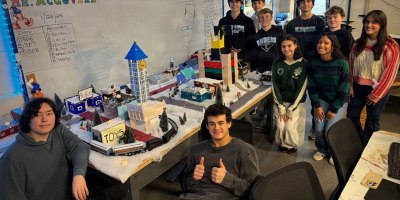 Students at Toms River High School East in Toms River show off a winter village created as part of the Emergent Futures Lab 3D printing curriculum partnership with the Armaments Center.