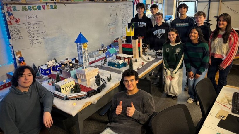 Students at Toms River High School East in Toms River show off a winter village created as part of the Emergent Futures Lab 3D printing curriculum partnership with the Armaments Center.