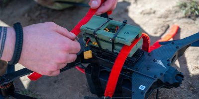 A team USA member secures equipment to a drone during the Military International Drone Racing Tournament and British Army Tactical Drone Competition at the Royal Military Academy Sandhurst, England, Sept. 15, 2026.