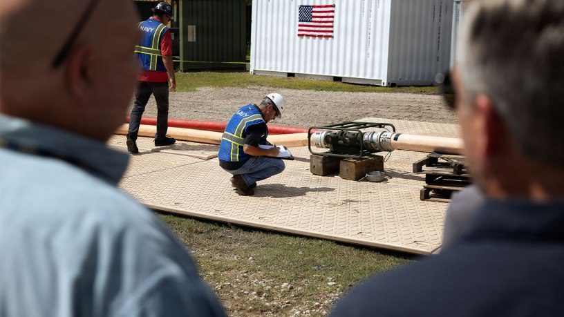 Steven Insco, a test coordinator supporting Blount Island Command, records the performance of a stand-alone pump-and-compressor configuration during an evaluation Sept. 16, 2026