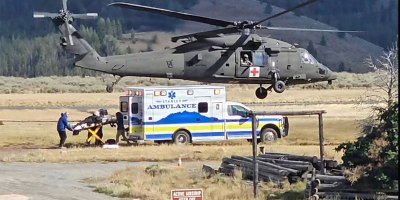 An Idaho Army National Guard HH-60 Black Hawk flies away after transferring a patient to civilian authorities after conducting a hoist rescue mission in Stanley, Idaho, on Sept. 17.