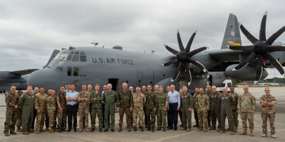 International Air Reserve Symposium delegates join for a group photo in front of a C-130H3 Hercules at Dobbins Air Reserve Base, Georgia, Sept. 24, 2026.