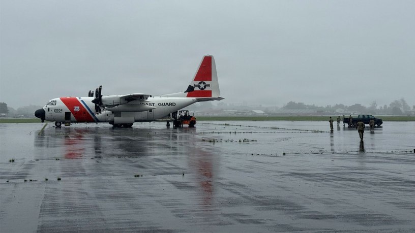 U.S. Coast Guardsmen assigned to Air Station Barbers Point in Kapolei, Hawaii and Hawaii Army National Guardsmen load supplies into an HC-130 Hercules aircraft in Hilo, Hawaii, Sept. 25, 2026. Hawaii Army National Guardsmen and Coast Guard crews worked in preparation for Hurricane Nolo. (U.S. Coast Guard photo courtesy Air Station Barbers Point)