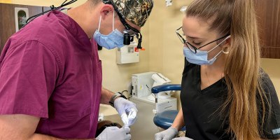 Capt. Wesley Hargett, general dentist, and Aurora Manes, dental assistant, provide dental care at Shira Dental Clinic, Fort Polk, Louisiana, Sept. 30, 2026. The pair recognized and responded to a patient experiencing anaphylaxis during a routine appointment Sept. 22.