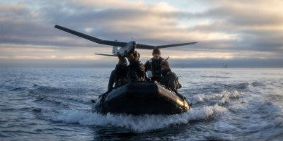 U.S. Marines and Sailors with 2d Reconnaissance Battalion, 2d Marine Division prepare to launch an RQ-20 Puma unmanned aircraft system from a combat rubber reconnaissance craft during Operation Baltic Sentry in Southern Finland, Feb. 28, 2025.