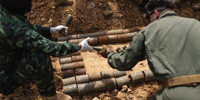Members of Thailand Mine Action Center and U.S. Marines with 3rd Explosive Ordnance Disposal, 9th Engineer Support Battalion, Combat Logistics Regiment 37, 3rd Marine Logistics Group stacks explosive ordnance during the Deployed for Training Bilateral EOD Exercise at Phu Lam Yai Training Ground, Nakon Ratchasima, Thailand, Aug. 28, 2026.