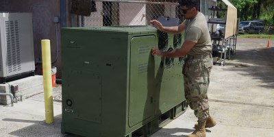 U.S. Air Force Staff Sgt. Kamakanilawaialii Pickering-Stevens, assigned to the Power Production Shop, 154th Civil Engineering Squadron, Hawai‘i Air National Guard, works on a backup generator provided to the Kaua‘i Humane Society following the impacts of Hurricane Lowell in Līhu‘e, Hawai‘i, on Sept. 22, 2026.
